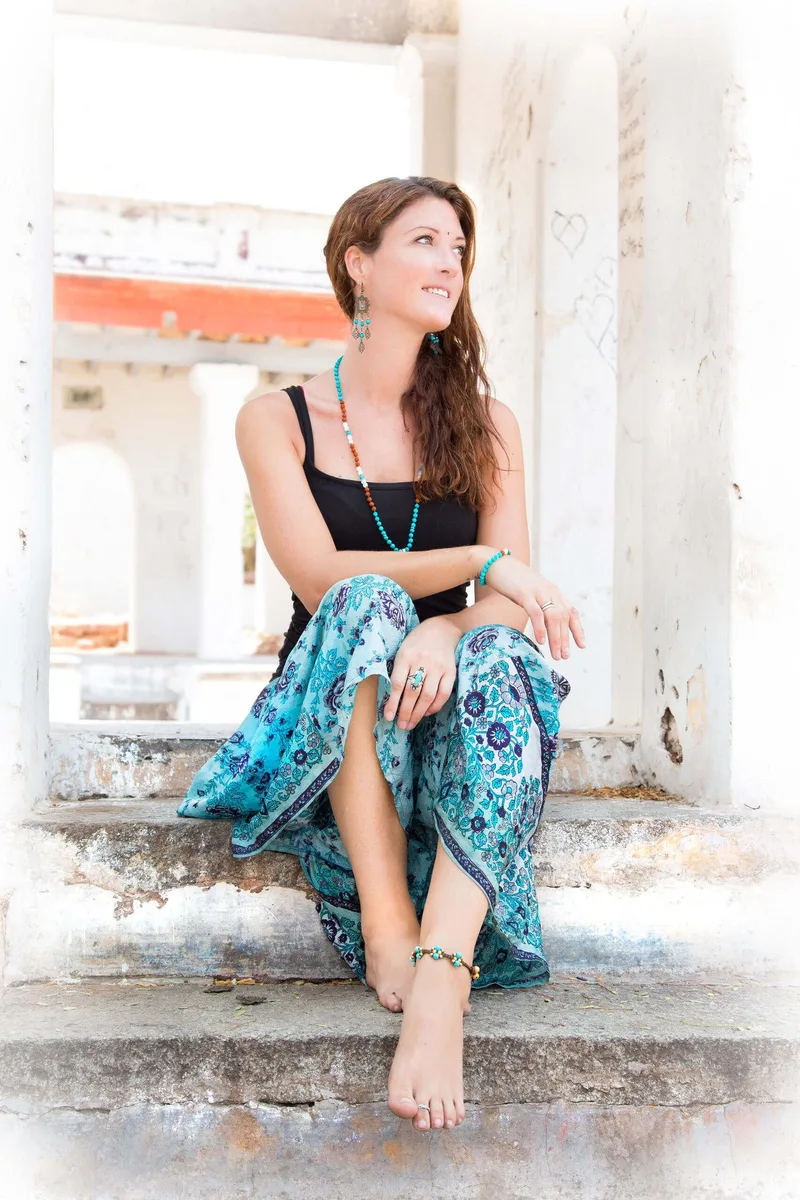 Woman seated on stone steps